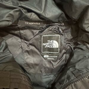Women’s Large North face puffer with hoodie , all black
